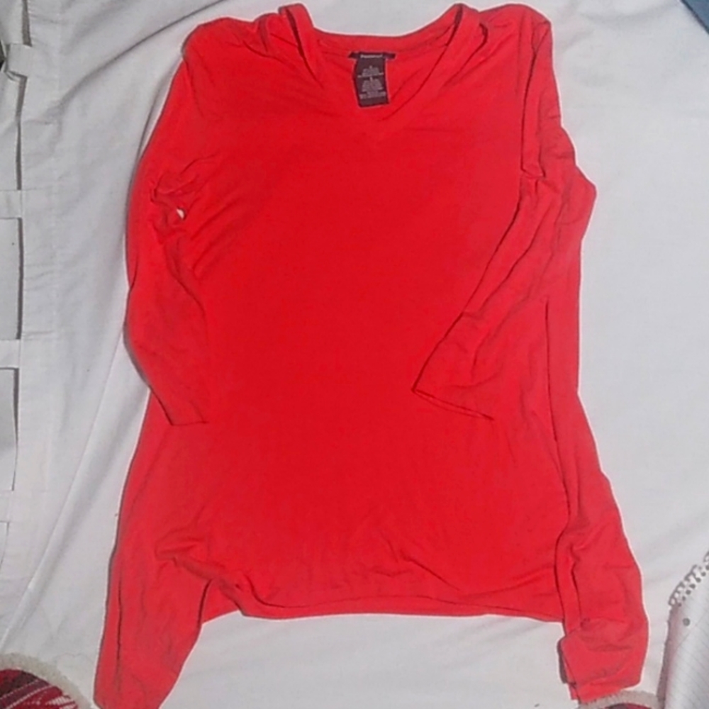 Small pinkish oranges color shirt